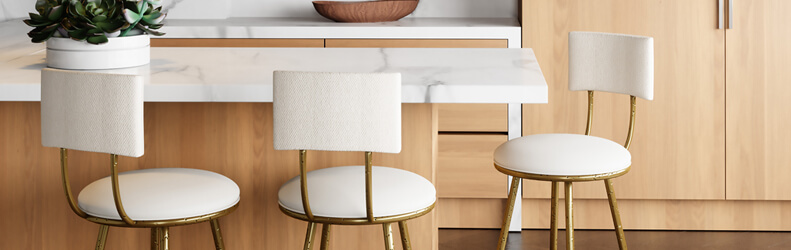 Featuring the Rei Bar Stools by Wesley Allen