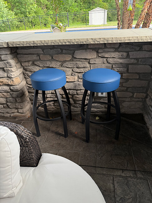 Holland's C8B1 Black Backless Stool with Blue Seat Cushions