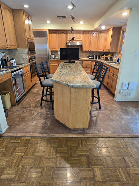 Wesley Allen's Raleigh Black Swivel Bar Stools with Backs in Customer's Kitchen