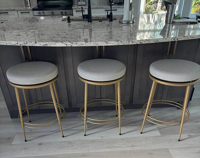 Amisco's Glenn Gold Backless Swivel Counter Stools at the Kitchen Island