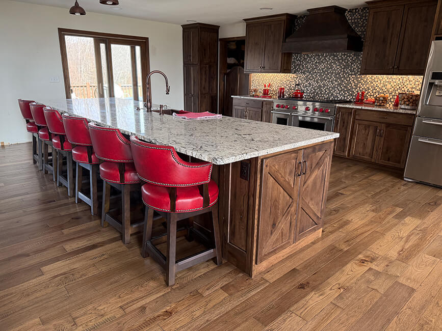 Style Upholstering's 141 Red Leather Swivel Bar Stools in Customer's Kitchen - Side