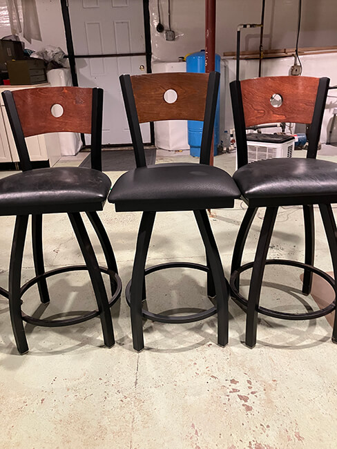Holland's Voltaire Black Swivel Bar Stools in Customer's Home