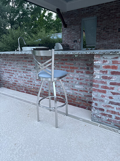 Stainless steel outdoor swivel bar stool by Holland