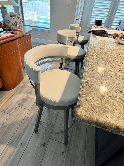 Amisco's Ronny Silver Counter Stools at Kitchen Island