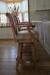 Darafeev's Classic Honey Oak Swivel Bar Stools in Leather and Nailhead Trim - In Kitchen