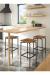 Amisco's Atlas Backless Swivel Bar Stool with Metal Base and Wood Square Seat in Modern Kitchen