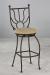 Wesley Allen's Sunburst Swivel Stool in Aged Rust metal finish and Tan seat cushion