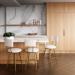 Wesley Allen's Rei Hammered Brass Swivel Bar Stools in Modern Kitchen