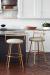 Wesley Allen's Ryo Hammered Swivel Bar Stool with Low Back in Modern Kitchen