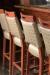 IH Seating Charlotte Transitional Wood Grain Bar Stools in Bar Restaurant - Close Up
