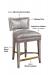 Select your seat and back cushion or choose an alternate look for the back. This bar stool has a nailhead trim along the back and seat, metal footplate finish, and is made of wood. It's customizable for you!