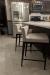 Amisco's Ethan Bronze Metal Low Back Bar Stools in Customer's Kitchen