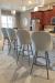 Amisco's Weston Modern Upholstered Swivel Bar Stools with Gray 4-Legged Base and Blue/White Upholstery in Traditional Kitchen