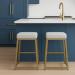 Wesley Allen's Riverton Modern Backless Bar Stools with Sled Base in Gold and White - In Modern Blue Kitchen