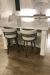 Amisco's Ronny Swivel Counter Stools in Silver and Gray - In Transitional Modern White Kitchen