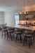 Amisco's Ronny Black Swivel Barstools in Brown Modern Kitchen