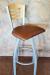 Holland's 830 Voltaire Swivel Metal Bar Stool at 36" Seat Height - With Wood Back and Red Seat Cushion